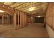 Unfinished basement with wood framing ready to be built for customization at 168 Maple Grove Ter, Peachtree City, GA 30269