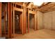 Unfinished basement with wood framing ready to be built for customization at 168 Maple Grove Ter, Peachtree City, GA 30269