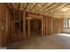 Unfinished basement with wood framing ready to be built for customization at 168 Maple Grove Ter, Peachtree City, GA 30269