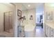 Bright bathroom features a soaking tub, vanity with a sink, and a glass-enclosed shower at 168 Maple Grove Ter, Peachtree City, GA 30269