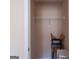 Empty closet with wire shelving and neutral-colored walls, awaiting your personal organization and storage at 168 Maple Grove Ter, Peachtree City, GA 30269