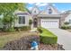 Charming home with stone accents, manicured landscaping, and a two-car garage, perfect for suburban living at 168 Maple Grove Ter, Peachtree City, GA 30269