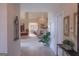 Inviting hallway with an arched doorway leading to a bright and spacious living area at 168 Maple Grove Ter, Peachtree City, GA 30269