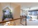 Upstairs living room boasts natural light, plants, furniture, and a ceiling fan at 168 Maple Grove Ter, Peachtree City, GA 30269