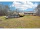 The backyard features an above-ground pool next to a deck, with the house visible in the background at 521 Cody Ln, Mcdonough, GA 30252