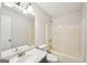 Full bath features a tub and shower combination, vanity and tile flooring at 521 Cody Ln, Mcdonough, GA 30252