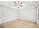 Bedroom featuring neutral carpeting, a ceiling fan and natural light from the exterior at 521 Cody Ln, Mcdonough, GA 30252