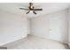 Neutral bedroom featuring plush carpet, a ceiling fan, and a well-lit, open feel at 521 Cody Ln, Mcdonough, GA 30252