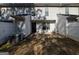 Rear exterior featuring a small concrete patio with air conditioning unit and white vinyl fence at 3535 Waldrop Trl, Decatur, GA 30034