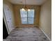 Bright dining room with a window and a chandelier at 3535 Waldrop Trl, Decatur, GA 30034