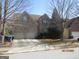 Inviting two-story brick home with a two-car garage and manicured landscaping at 4286 Rosehall Ct, South Fulton, GA 30349