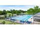 A beautiful community pool with lounge chairs and green surroundings, perfect for relaxation and recreation at 1720 Goodwin Dr, Hampton, GA 30228
