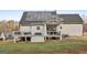 Large backyard with deck, patio, solar panels and fenced-in yard at 1144 Pickets Ridge Dr, Locust Grove, GA 30248