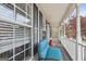 Cozy front porch with seating and seasonal decorations, showcasing comfort at 1144 Pickets Ridge Dr, Locust Grove, GA 30248