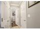 Hallway with linen closet, and direct access to laundry room at 1144 Pickets Ridge Dr, Locust Grove, GA 30248