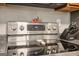 Stainless steel Samsung stove top with granite countertops and modern finishes at 1144 Pickets Ridge Dr, Locust Grove, GA 30248