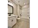 Bright bathroom with updated vanity, bathtub, and toilet at 2141 Bradbury Rd # 1, Moreland, GA 30259