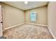 Bright bedroom with large window, plush carpeting, and neutral color at 2141 Bradbury Rd # 1, Moreland, GA 30259