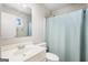 Cozy bathroom with a single sink vanity and shower at 4097 Cripple Creek Nw Dr, Kennesaw, GA 30144