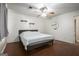 Bedroom with hardwood floors and a ceiling fan at 4097 Cripple Creek Nw Dr, Kennesaw, GA 30144
