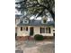 Charming townhouse with a well-maintained front yard and dormer windows at 5509 Park Place South, Atlanta, GA 30349