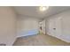 Neutral carpeted bedroom with closet space at 30 Fairfield Dr, Ellenwood, GA 30294
