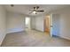This bedroom has a ceiling fan and neutral carpet at 30 Fairfield Dr, Ellenwood, GA 30294