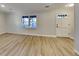Bright living room showcasing new floors and a fresh coat of paint at 30 Fairfield Dr, Ellenwood, GA 30294