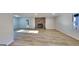 Spacious living room features new floors and a brick fireplace at 30 Fairfield Dr, Ellenwood, GA 30294