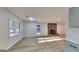 The main living space has a brick fireplace, new floors and fresh paint at 30 Fairfield Dr, Ellenwood, GA 30294