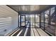 Screened porch providing outdoor living space with a concrete floor at 30 Fairfield Dr, Ellenwood, GA 30294