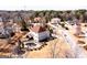 Aerial view of brick home showcasing a luxurious pool area and surrounding neighborhood at 1214 Greenridge Ln, Lithonia, GA 30058