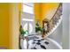 Inviting foyer showcases elegant entry doors, staircase, and designer touches at 1214 Greenridge Ln, Lithonia, GA 30058