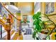 Spacious foyer with staircase, patterned marble floors, and elegant console table at 1214 Greenridge Ln, Lithonia, GA 30058