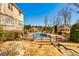 Beautiful backyard featuring a fenced in in-ground pool and gazebo at 1214 Greenridge Ln, Lithonia, GA 30058