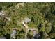 Aerial view of property outlining the boundary and highlighting its placement within a tree filled lot at 2275 Honeysuckle Se Ln, Smyrna, GA 30080