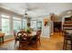 Dining room featuring hardwood floors, decorative ceiling fan and ample natural light at 2275 Honeysuckle Se Ln, Smyrna, GA 30080