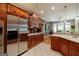 Charming kitchen with stainless steel refrigerator and adjacent dining area at 2275 Honeysuckle Se Ln, Smyrna, GA 30080
