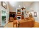 Bright living room featuring hardwood floors, vaulted ceiling, fireplace and ample natural light at 2275 Honeysuckle Se Ln, Smyrna, GA 30080
