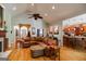 Living room featuring vaulted ceiling, hardwood floors, comfortable seating and decorative accents at 2275 Honeysuckle Se Ln, Smyrna, GA 30080