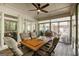Screened-in porch featuring vaulted ceilings, ceiling fan and wood flooring at 2275 Honeysuckle Se Ln, Smyrna, GA 30080