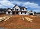 Two-story home under construction with a charming design, showcasing its potential at 454 Snead Road # 3, Fayetteville, GA 30215
