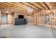 Unfinished basement featuring exposed wood beams ready for customization at 124 Shelton Dr, Mcdonough, GA 30252