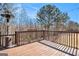 Back deck area perfect for outdoor gatherings with space heater and wood railing at 124 Shelton Dr, Mcdonough, GA 30252