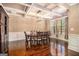 Formal dining room with beautiful coffered ceilings and natural light at 124 Shelton Dr, Mcdonough, GA 30252