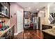 Kitchen featuring stainless appliances, granite countertops, and dark wood cabinetry at 124 Shelton Dr, Mcdonough, GA 30252