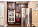 Kitchen featuring stainless steel appliances and dark cabinetry at 124 Shelton Dr, Mcdonough, GA 30252