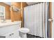 Cozy bathroom features a vanity, toilet, and shower with neutral-colored walls at 620 Bell Se Rd, Conyers, GA 30094