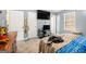 Bedroom featuring neutral colors, a large window, carpeted floors and two big closets at 620 Bell Se Rd, Conyers, GA 30094