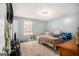 Comfortable bedroom with a window for natural light and plenty of room for furniture at 620 Bell Se Rd, Conyers, GA 30094